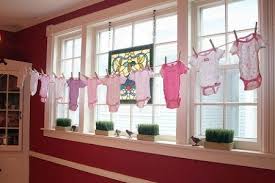 Easy And Affordable Decoration Ideas For A Baby Shower How To Simple Baby Shower Ideas Baby Shower Clothesline Simple Baby Shower Girl Baby Shower Decorations