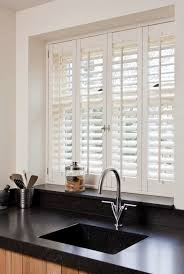 Beyond Good Looks Add Value And Style To Your Home With This One Element Kitchen Window Blinds Indoor Shutters Wooden Window Blinds