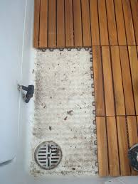 Diy Teak Tile Flooring Teak Tiles Refresh A Tired Old Boat Deck House Bathroom Designs Small Bathroom Decor Teak Shower Floor