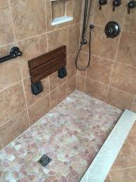 Pin By Chesapeake Family Flooring On Tile Pebble Shower Floor Bathroom Shower Design Shower Tile