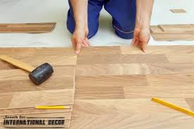 How To Lay Laminate Flooring On Uneven Concrete Floor Installing Laminate Flooring Laminate Flooring Flooring Contractor