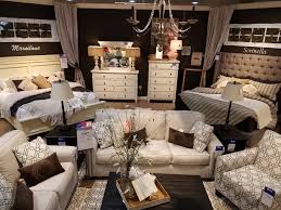 Pin By Amy Sarna On Dsg Store Designs Ashley Furniture Showroom Furniture Furniture Showroom