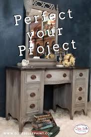 This Lovely Neutral Vanity Has A Base Of Chocolate And Layers Of Pine Cone Spanish Moss Vi Painting Furniture Diy Furniture Makeover Fabric Painted Furniture