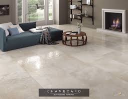 Living Room With Fireplace And Hammered Effect Semi Polished Porcelain Tile Floor Porcelain Tile Floor Living Room Tile Floor Living Room Living Room Designs