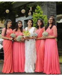 Bridesmaids In Peach Saree Ensembles Bridesmaid Saree Bridesmaid Dresses Indian Bridesmaid Dresses