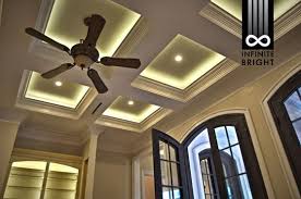 The Drama Of This Lighting Combo Is Phenomenal Coffered Ceiling With Cove Led Lighting This Can Cove Lighting Ceiling Coffered Ceiling False Ceiling Design