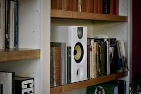 Audio Bowers And Wilkins White Bookshelf Speaker Is Part Of The Audio System In A Library Come Office White Bookshelves Home Technology Smart Home Technology