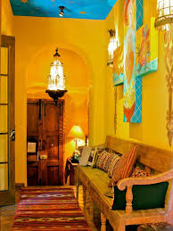 Whimsical Mexican Style Entry Hall This Golden Yellow Spanish Entry Hall Zaguan Features Hand Spanish Style Decor Mexican Home Decor Mexican Interior Design