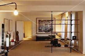 See Through Room Divider In A Living Room Shelves Between The Floor And Ceiling Living4media Room Divider Shelves Room Divider Living Room Shelves
