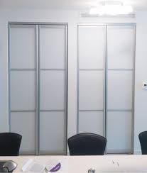 Custom Bifold Closet Doors Snow White Glass Panels And Aluminum Frames Made To Custom Order Clo Custom Bifold Closet Doors Modern Closet Doors Closet Doors