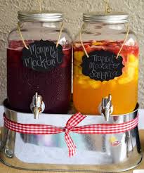 Mommy Mocktail Cocktail And Tropical Moscato Sangria Drink Table For A Brewing A Baby Or Baby Bbq Baby Shower Drinks Baby Shower Snacks Tropical Baby Shower