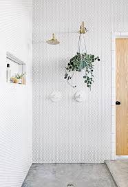 Alyson Fox S Austin Texas Home Domino Minimalist Bathroom Inspiration Minimal Apartment Penny Tile