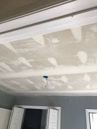 How To Remove Popcorn Ceilings Like A Pro Smoothing Textured Ceilings Removing Popcorn Ceiling Popcorn Ceiling Ceiling Texture