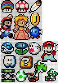 Un Anniversaire Mario Bross La Fee Biscotte Perle Hama Mario Art Perle Perles Fondues