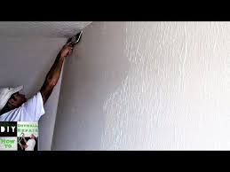 How To Skim Coat Walls Using The Paint Roller Trick Skim Coating Paint Roller Drywall Texture