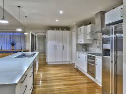 White Kitchen With Timber Floors Kitchen Inspirations Bright Kitchens Kitchen Flooring