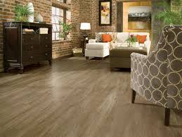 Light Grey Vinyl Flooring In The Living Room With Exposed Brick Walls Luxury Vinyl Plank Luxury Vinyl Flooring Vinyl Flooring