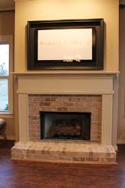 Pin By Carol Carlson On Harris Doyle Living Rooms Brick Fireplace Remodel Fireplace Surrounds Home Fireplace