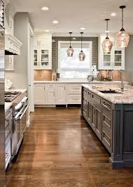 Gray Island And White Cabinets Granite Top White Oak Floor With Ebony Stain G Kitchen Backsplash Designs Kitchen Tile Backsplash With Oak Oak Floor Kitchen
