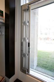 Glassessential Folding Window Grilles Are Designed To Provide Elegant Look Strong Security Barrier Wit Security Shutters Folding Windows Window Security Bars