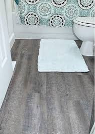 Applying Peel And Stick Floor Tiles Cheap Bathroom Flooring Peel And Stick Floor Floor Makeover
