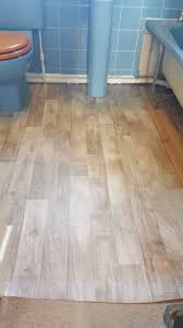 Wood Effect Vinyl Flooring Fitted To A Bathroom At Costessey Laid On 6 Mm Fg1 Rated Plywood Due To Very Uneven Fl Vinyl Flooring Flooring Vinyl Tile Flooring