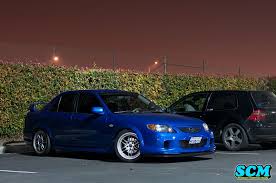 Mazda Protege Yellow Enkei Rpf1 Rides Styling In 2020 Mazda Protege Mazda Corolla Car