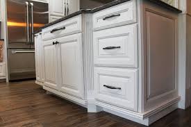 This Kitchen Displays Wellborn Cabinet Inc Premier Series Seville Square Door Style In Oak Wood Species With A Glac Wellborn Cabinets Kitchen Display Cabinet