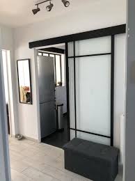 Porte Coulissante Vitree Noir Emma Artens H 204 X L 83 Cm Leroy Merlin Porte Coulissante Porte Coulissante Atelier Porte Galandage