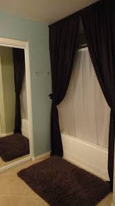 Bathroom Shower Curtains That Are Hung From The Ceiling In Front Of Actual Curtain Looks So Good Home Home Decor Home Diy