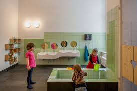 Day Care Center Interior Design Beautiful Day Care Interior In Simple And Natural Design By Baukind Kindergarten Design Kindergarten Interior Restroom Design