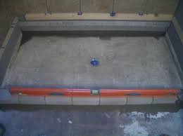 Building A Concrete Shower Pan On A Basement Floor Brick Curb For A Shower Shower Floor Diy Shower Pan Basement Remodel Diy