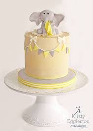 Gender Neutral Baby Shower Cake Featuring Bunting And Baby Elephant Topper Baby Shower Cakes Neutral Baby Shower Desserts Boy Baby Shower Cakes