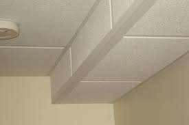 Drop Ceilings For Basements We Can Hide It By Building A Box Using The Ceiling Grid And Tile Or Ceiling Tiles Basement Dropped Ceiling Basement Ceiling