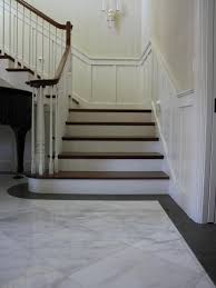 Sweeping Staircase And Marble Entry Marble Entryway Foyer Flooring Entryway Tile