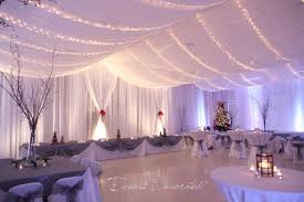 Winter Wedding Reception Draped Ceiling Walls With Twinkle Lighting Chair Covers And Sashes Wedding Ceiling Wedding Ceiling Decorations Ceiling Draping