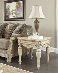The Ortanique End Table Compliments The Showood Trim Of The Parkington Bay Collection Ashley Furniture Furniture End Tables