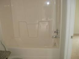 How To Change The Color Of A Fiberglass Tub Shower Enclosure Hunker Fiberglass Shower Stalls Shower Tub Tub Remodel