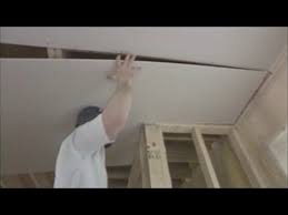 How I Hang Sheetrock Drywall On The Ceiling By Myself Or Yourself Diy Youtube Basement Ceiling Basement Ceiling Ideas Cheap Drywall Ceiling