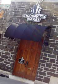The Starring Bakery Of The Hit Show Ace Of Cakes Resides In Baltimore Md Charm City Cakes Charm City Cakes Baltimore City Baltimore