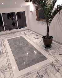 Here S A Great Design In Our Brass Inlay Marble Tiles With White Thassos Marble Border And Blue De Savoie Marble Marble Inlay Designs Marble Inlay Marble Tiles