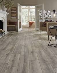 A European White Oak Look That Evokes Images Of Gently Time Worn Flooring In French Chateaus Mannington S Black House Flooring New Homes Oak Laminate Flooring