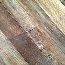 Vinyl Plank Flooring Vs Laminate Vs Porcelain Vs Linoleum Pros Cons Of Luxury Tile Vs Wood Laminate Flooring Wood Floors Wide Plank Flooring