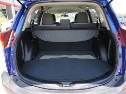 Check Out The Stylish Back End Of The Toyota Rav4 In Blue Crush Metallic Available With Adjustable Power Liftgate This Is The I Rav4 Blue Crush Driving Test