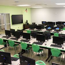 C Leg Tables And Inspiration Chairs Turns This Media Room At Pinecrest Glades Academy In Miami Fl In School Furniture Modern Classroom Collaborative Furniture