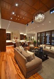 Modern Living High Ceiling Home Decorating Trends Homedit High Ceiling Living Room Living Room Lighting Ceiling Lights Living Room
