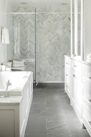 Carrera Marble Herringbone Wall Tile Carrera Tile Grey Porcelain Floor Tile White Cabinetry G Small Bathroom Remodel Bathrooms Remodel Small Bathroom Tiles
