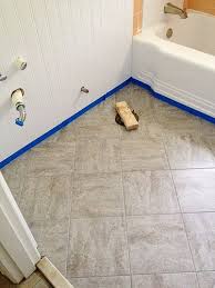 Remodelaholic Bathroom Redo Grouted Peel And Stick Floor Tiles Peel And Stick Floor Bathroom Redo Stick On Tiles