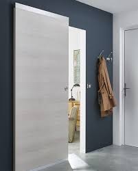 Avec Son Aspect Bois Clair Blanchi La Porte Summa Apportera Une Touche Elegante A Votre Interieur Completee Par Porte Coulissante Porte Bois Porte Galandage