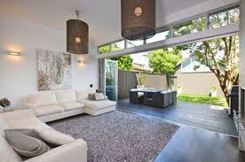 17 Stunning Ways To Use Bi Folding Doors In Living Rooms Home Contemporary House Home Decor